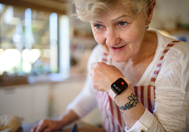 image of an senior person with a smartwatch